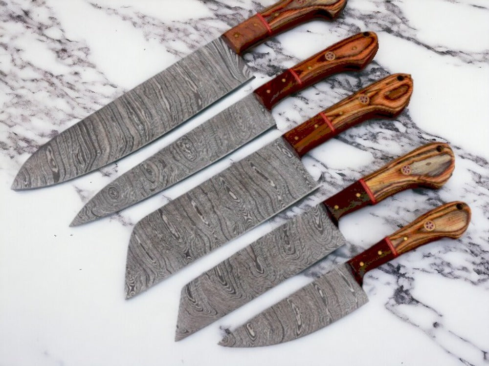 Handmade chef knife set of 5 in Damascus steel.