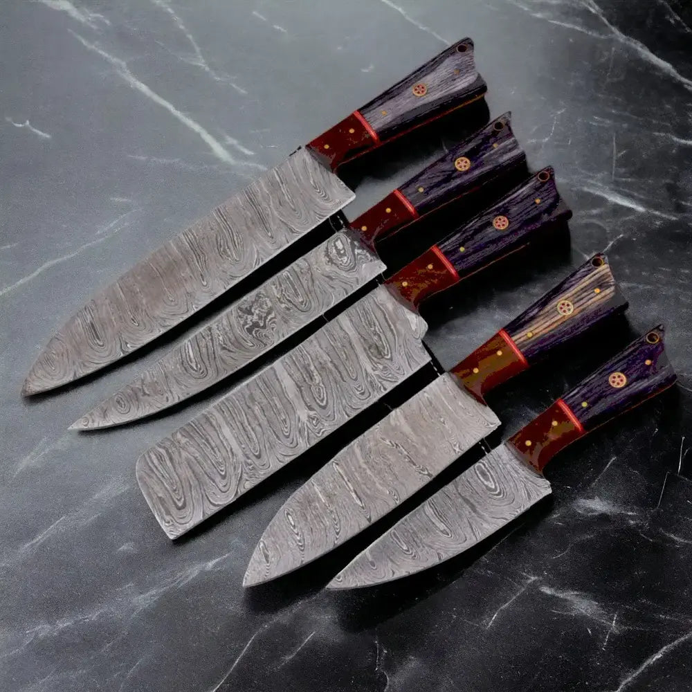 Handmade chef knife set of 5 in Damascus steel.